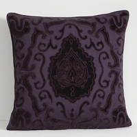 A chic palette of black and rich purple is exquisitely detailed with elegant jet beading and intricate embroidery. Timeless paisley gets a new edge when paired with bold leopard for a stylish juxtaposition of masculine and feminine.