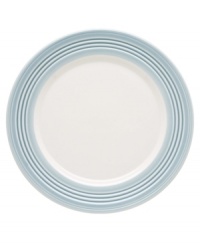 This charming porcelain accent plate features a four-ringed border. Mix and match with other Tin Can Alley Blue pieces for a subtly varied table setting.