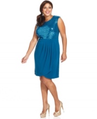 Land a holiday party-perfect look with Spense's sleeveless plus size dress, featuring a sequined top and wrap skirt.