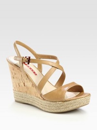 EXCLUSIVELY AT SAKS. Leather criss-cross design with cork wedge and espadrille platform. Cork and hemp wedge, 4 (100mm)Cork and hemp platform, 1 (25mm)Compares to a 3 heel (75mm)Leather upperLeather liningRubber solePadded insoleImported