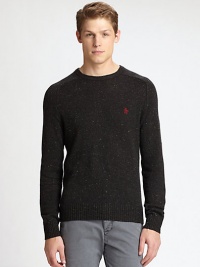 Classic crewneck sweater is impeccably knitted in a rich wool and cotton blend with contrasting donegal details, accented with an embroidered penguin detail at the chest.CrewneckRibbed knit collar, cuffs and hemWool/cotton/acrylicDry cleanImported