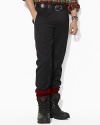 Sleek and modern with accenting zip pockets, this versatile pant provides an impeccable accompaniment to any topper.