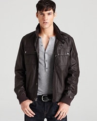 You don't need to fly an F-16 to rock this fine leather bomber. With an upscale edge, Michael Kors keeps your look hip and authentic.