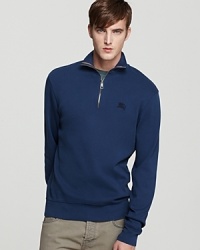 Sport the look of casual distinction and heritage appeal with this handsome sweatshirt design from Burberry Brit.