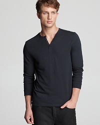 Considered details like buttons on the cuff of this soft and casual henley are what separate John Varvatos designs from the others.