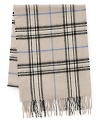 Brace yourself when the cold weather comes with this warm, cozy scarf in soft cashmere, patterned in a handsome plaid design for classic appeal.