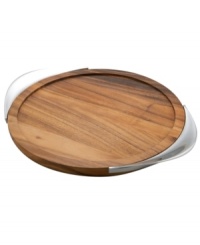 Add chic sophistication to cocktail service or champagne toasts with the Tilt bar tray from Nambé. Lustrous metal handles flank acacia wood with a raised rim to prevent spills. Coordinates with Tilt barware and stemware.