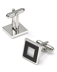 The simple refinement of these black and white cufflinks shows off your discerning taste at the office and when you raise your glass at the fundraiser's champagne toast.