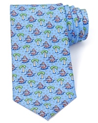 Get a glimpse of Santa's vacation with this witty and colorful tie design from Vineyard Vines, featuring old St. Nick showing off his prize catch.