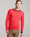 A fun, easy-going crewneck sweater from the master of carefree-modern-retro, MARC BY MARC JACOBS, with a pinch of designer flair at the front collar for good measure.