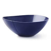 This fashion-forward porcelain dinnerware has signature DVF style - bold, unique, modern. The highly glossed surface, intentionally irregular curves and exposed seams create a chic tablescape and offer infinite styling possibilities. Mix and match with other colors in the Pebblestone collection to create your own signature look.