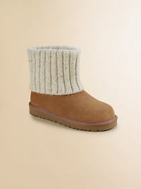 A cute and cozy pair in rich suede with a ribbed foldover collar.Pull-on styleCow suede and knit upperSheepskin liningPadded insoleEVA soleImported