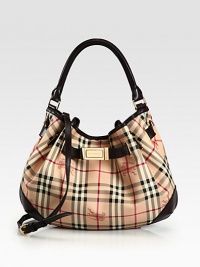 A slouchy, versatile shape featuring the signature Burberry check on smooth PVC with sleek leather trim. Leather top handle, 6½ dropAdjustable detachable leather shoulder strap, 19¾-23½ dropMagnetic snap closureOne inside zip pocketTwo inside open pocketsCotton lining14½W X 12H X 3½DImported