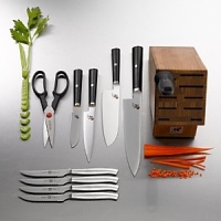 This 7 piece block set is exclusively at Bloomingdale's. It features authentic Japanese blade styles and eastern edge angles which combined with high carbon steel produce superior sharpness. It also features beautiful micarta handles. The set includes: kudamono knife (paring), shotoh knife (utility), santoku knife, gyutoh knife (chef's), kitchen shears, sharpening steel and bamboo block.