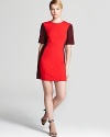 Tibi masters color blocking with this short-sleeved shift dress fashioned in easy ponte go-to style.