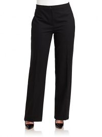 THE LOOKNarrow waistband with button closureFlat-front styleUnfinished hemBack elastic waistbandBack waist dartsTHE FITRise, about 11Inseam, about 35THE MATERIALWool/elastaneCARE & ORIGINDry cleanImported