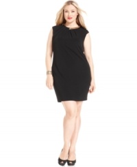 A glimmer of gold at the neckline of this plus size Calvin Klein dress adds panache to the sleeveless sheath silhouette.