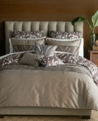 A spectrum of warm, brown tones commingle with eclectic patterns in this Capetown comforter set from Bryan Keith for an enticing appeal in the bedroom. Boasting intricate embroidery and printed elements, this set comes complete with shams, bedskirt and decorative pillows for an extra boost of style.