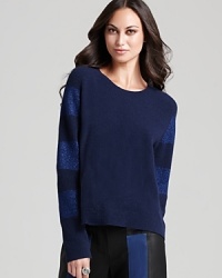 A dash of dazzle takes your classic Halston Heritage sweater from daytime staple to fashion stunner. Slip on the sumptuous wool-and-angora silhouette and shine brilliantly in shades of sparkle.