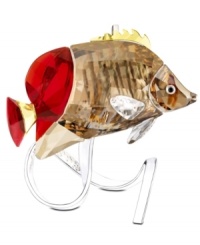 Far from the reef, this exquisite butterflyfish is captured in brilliant Swarovski crystal. Gold, copper and red tones shimmer much like they would under water while a silvertone branch with embossed coral captures the gentle movements of the sea.