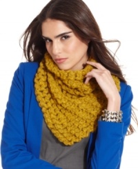 Keep cold weather under wraps with this luxurious scarf in a soft knit from David & Young.