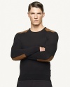 Supple leather patches grace the elbows and shoulders of a trim cotton-blend crewneck for a handsome, modern aesthetic.