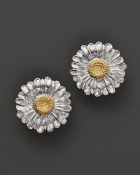 Blooming daises are detailed in 18K yellow gold accents on Buccellati's button earrings.