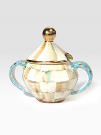 An elegant, one-of-a-kind serving piece, in hand-painted terra cotta with color-dragged checks and lustred gold accents, is a charmingly cheery addition to your tea party.Ceramic with golden lustre6 diam.; 8.5 tallHand washMade in the USA