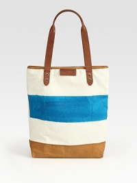 Paint-stripe canvas pairs with rich leather in this roomy top-handle carryall.Leather double top handles, 10 dropMagnetic top closureTwo outside open pocketsOne inside zip pocketFully lined15W X 13½H X 3DImported