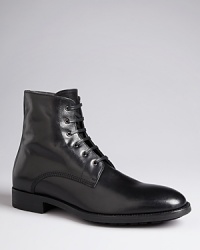 Hold your ground in these polished leather boots from Two Boot New York, a solid addition to your dressed-up wardrobe.