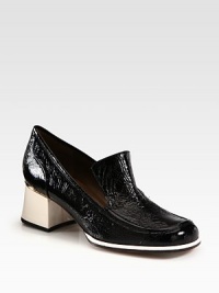 Traditional loafer-inspired pump in crinkled patent leather with a moderate block heel. Self-covered heel with metal insert, 2 (50mm)Crinkled patent leather upperLeather lining and solePadded insoleMade in Italy