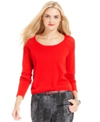 Layer up in DKNY Jeans' sweater - it looks especially chic with printed jeans.