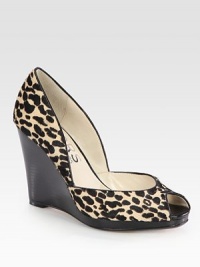 A sturdy wedge lifts this fierce peep toe design of leopard-print calf hair with smooth leather trim. Stacked wedge, 3¾ (95mm)Stacked platform, ¾ (20mm)Compares to a 3 heel (75mm)Leopard-print calf hair upper with leather trimPeep toeLeather lining and solePadded insoleImportedOUR FIT MODEL RECOMMENDS ordering true size. 