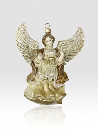 From the Jay Strongwater Angelic collection a palette of creams, golds and silver accents have been painted on this finely detailed Angel Glass Ornament. GlassCrystalHandmade, hand-painted and hand-set5.5H X 5.75W X 2.5DImported