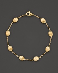 From the Siviglia collection, a bracelet with medium-sized beads, designed by Marco Bicego.