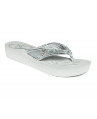 Are you a GUESS Girl? The Scarletta EVA thong sandals blend casual and glam with metallic shine and shimmery sequins.