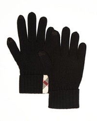 The supple warmth of cashmere keeps your hands warm even as you're typing a critical text message to the client on a brisk walk to the train platform. With a signature check accent at the wrist, these gloves are classic Burberry.