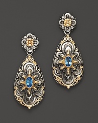 Blue topaz in intricately engraved sterling silver and 18K yellow gold from Konstantino.