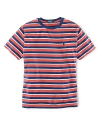 Crafted from super-soft cotton jersey, an essential tee is adorned with a bold, striped pattern for preppy appeal.