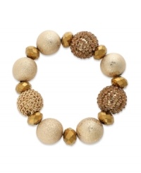 With a natural look, this beaded bracelet from Alfani adds texture with diamond-blasted, faceted, and rhinestone chain-wrapped accents. Crafted in 12k gold-plated mixed metal. Approximate diameter: 3 inches.