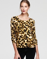 Increase your animal magnetism with this Hurley sweater that flaunts a ferociously chic and trendsetting cheetah print this season.