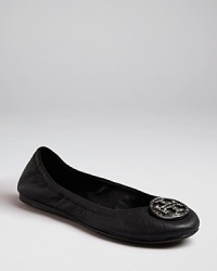 A beloved Tory Burch ballet flat accented with a crystal-encrusted logo plaque.