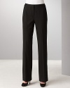 These versatile straight-leg pants are menswear inspired but are ingeniously tailored for a more feminine fit. Wear with the matching tailored jacket for a smart office look. Flat front, banded waist, hidden front zipper, hook-and-bar closure. Clean, no-pocket style. Back darts.