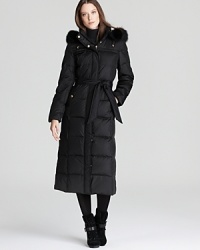 Ellen Tracy's full-length down coat keeps warm with the plushest fox fur trim. A belted waist lends a flattering fit, while gold-tone hardware feels oh-so-chic.