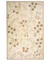 Delicate florals wend across this muted ivory rug from Momeni's Capri collection, resulting in a whimsical look that's straight out of a fairy tale. Hand carving adds exquisite detail to this rug's antique-style charm.