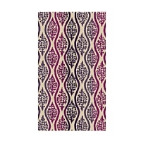 Created in rich textural jacquard, this Natori beach towel surrounds you with vibrant colors, stylized design and plush luxury.