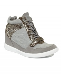 Casual chic with bite: The Les 200 wedge sneakers by Nine West Original are a brilliant high-top with snake-embossed detail for one-of-a-kind style.