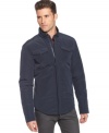 A jacket as slim-lined and easy to wear as a shirt: Armani Jeans shirt-jacket with concealed zip up closure, military-inspired chest pockets, and standing collar.