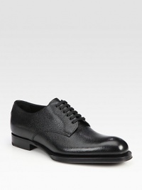 Leather lace-up style with exaggerated sole.Leather upperLeather liningWood/rubber soleMade in Italy