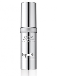 A line-filling formula for the eye area that is an effective alternative to injectable fillers. A natural ingredient, extracted from a tree that grows in India, plumps the skin immediately to minimize the appearance of lines and wrinkles, while various peptides help rebuild the skin's structure over time. 0.5 oz. 